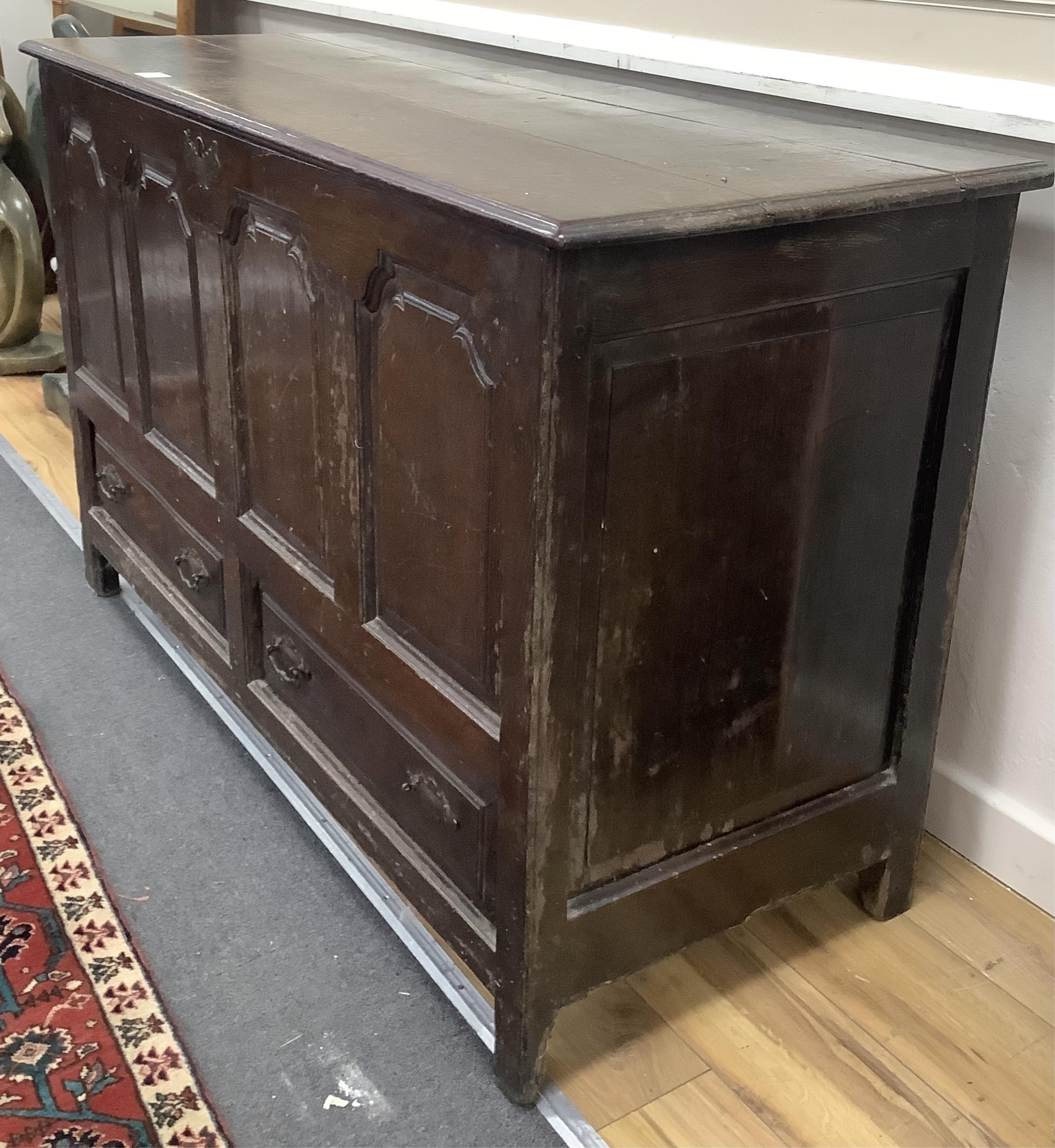 A mid 18th century North Wales oak mule chest, width 136cm, depth 53cm, height 84cm. Condition - poor